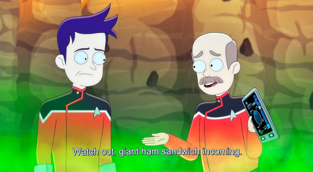 Lower Decks scene. (Lower Decks is amazing and if you're anti-cartoon just give it a chance friendo)
We see Boiler and another older Starfleet officer standing against a rock wll, with green air up to their necks, like they're standing in swampy or poisonous air. Boims, as per usual, looks verklempt while older fella explains something holding his PADD. Closed caption reads, "Watch out, giant ham sandwich incoming."