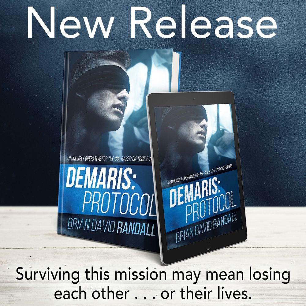 A blue book that says Demaris Protocol by Brian David Randall on the cover.