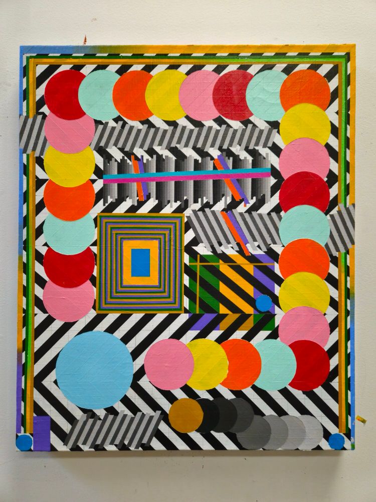 Graphic print with a black and white chevron and colorful circles