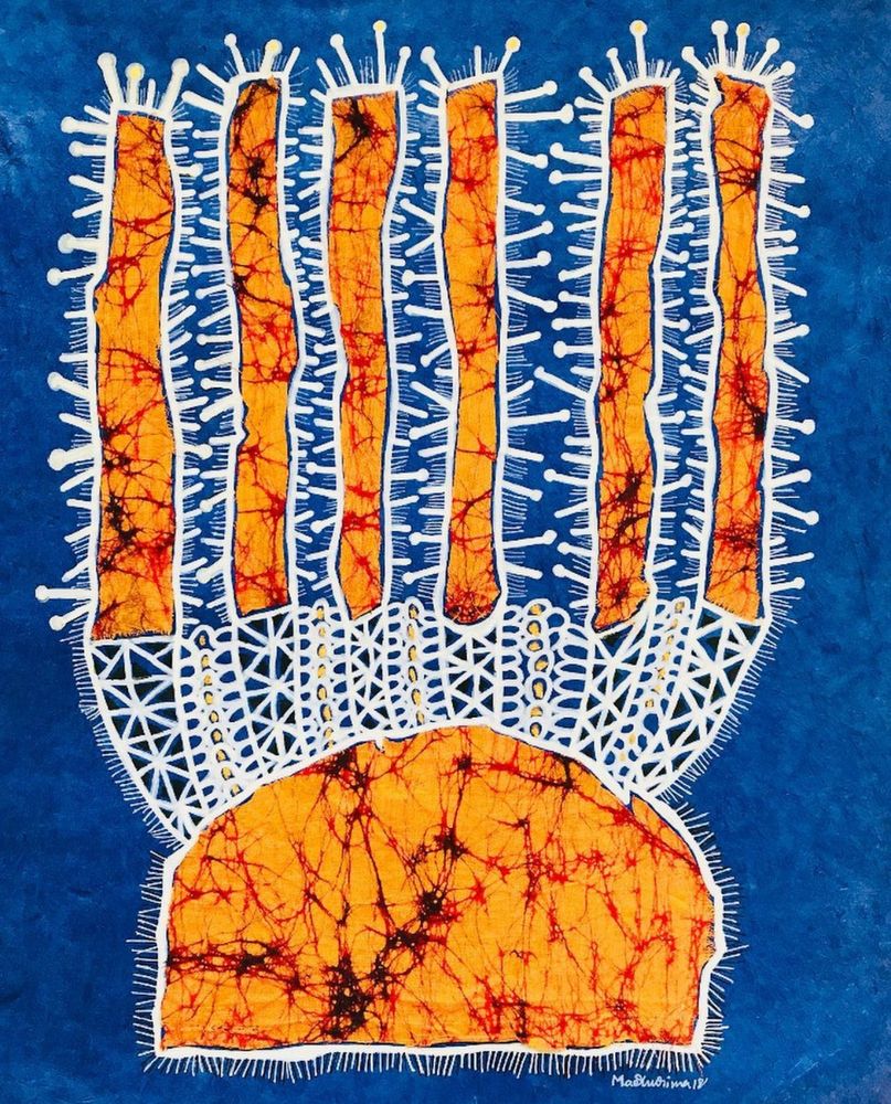 Blue, orange, and white batik print