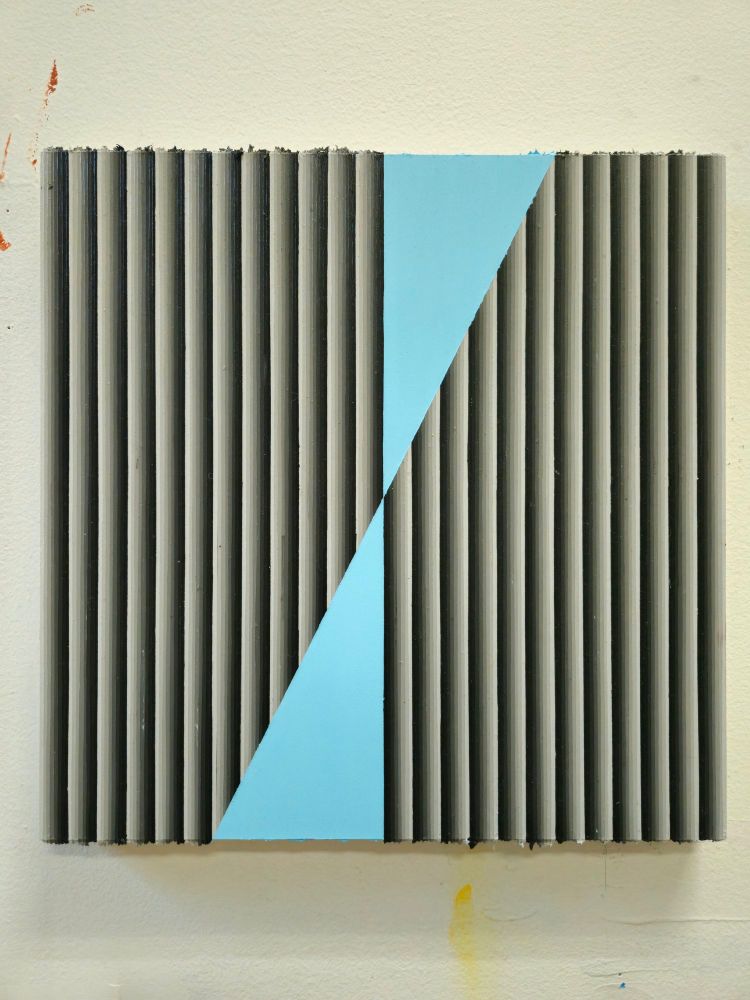 Graphic painting with vertical lines and two light blue triangles