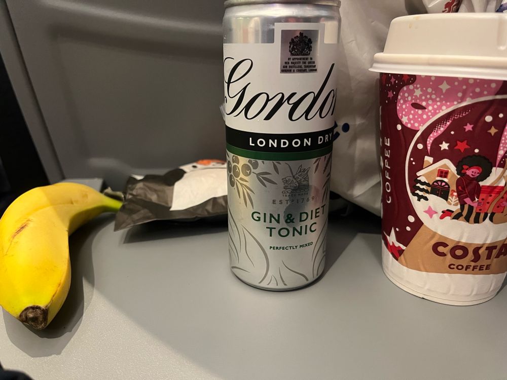 Banana. Can of gin and tonic. Coffee