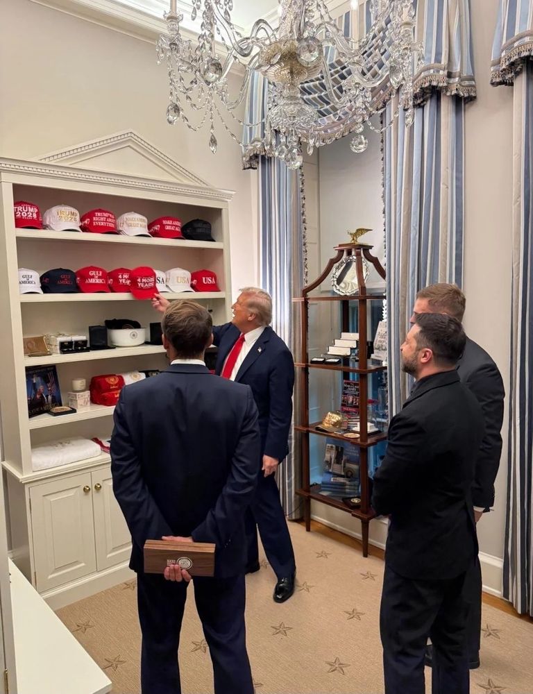 Donald Trump showing off maga hats and Trump 2028 hats to world leaders. 
