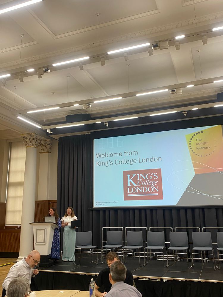 A photo of Hillary and Anna introducing the day with a welcome from KCL. 