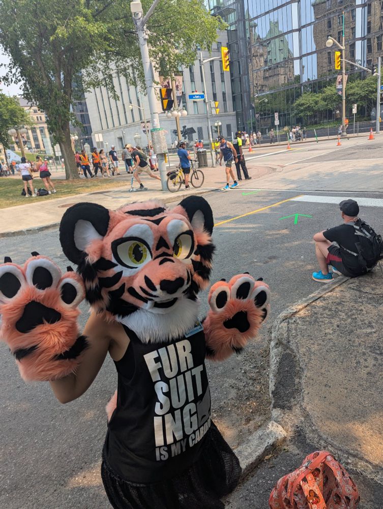 A'Ja cheering on runners during the Ottawa Ironman