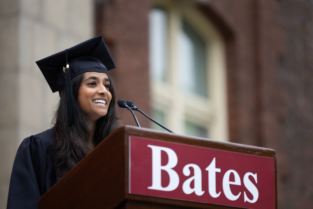 Senior Speaker Aanika Patel delivers the Senior Address at a Bates podium. 