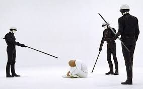 THX 1138 is tortured in a limitless prison by faceless cops