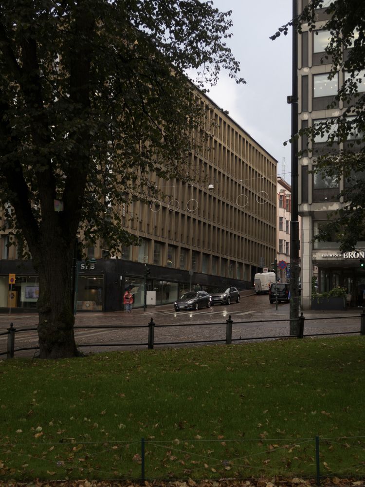 Trees, grass and a building in view from Esplanadi