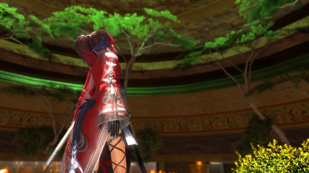 Same dress from picture 1: red long dress, silver wave-ish things on the bottom. She stays with the back, kinda side-ish to the camera. She is looking up, to the falling light into the building she is in. Around her are some trees, growing on a wall.