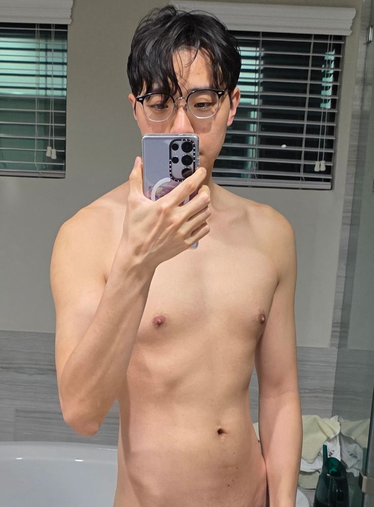 Shirtless mirror selfie after a shower