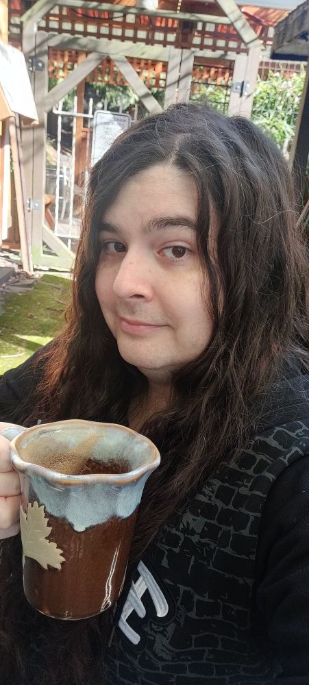 Joyces outdoors having a coffee