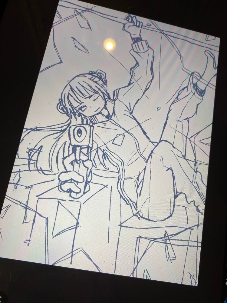 ジャージを着ている女性が、銃をこちらに向けているところを描いたイラストです