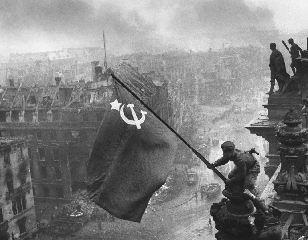 Flag of victory over the Reichstag by Evguéni A. Khaldei, May 2 1945