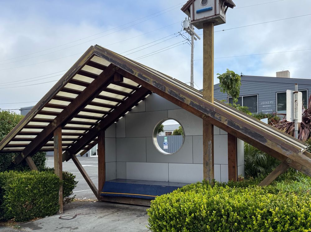 Boat bus stop with bird house