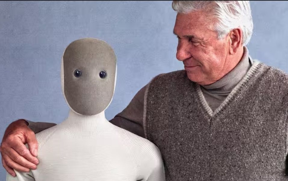 picture taken from an advertisement for a home robot, am old man smiling lovingly at the robot with his arm around it