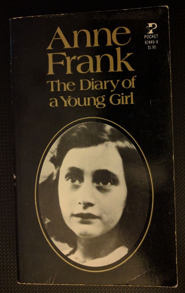 Black book cover titled "Anne Frank The Diary of a Young Girl" with black and white portrait of Anne.