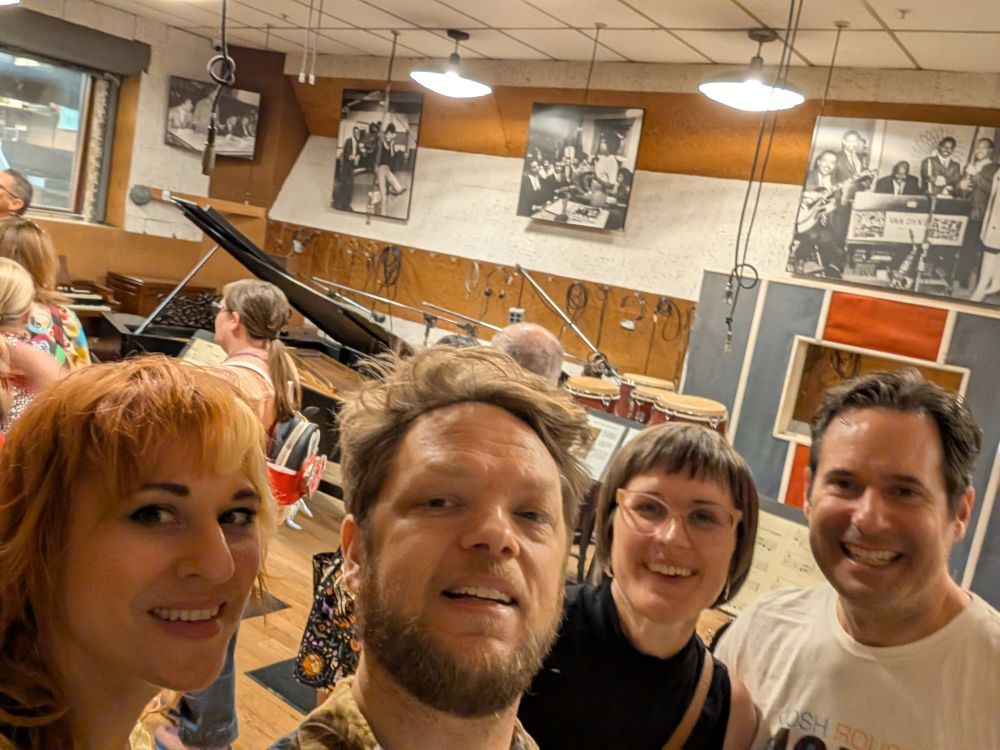 4 people inside studio A of the Motown Museum 