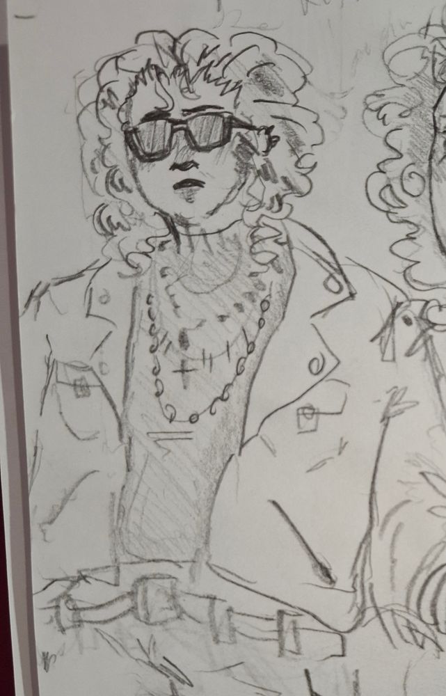 Traditional art of a re-design of my oc Leslie (he/him)
He's wearing sunglasses and lots of necklaces.