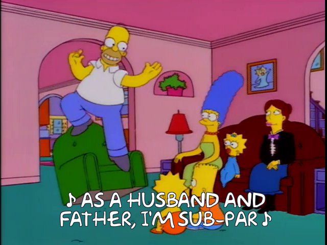 Homer Simpson standing on a chair singing. His family and Shary Bobbins are watching. The caption includes notes to indicate it's sung. The lyrics are "as a husband and father, I'm sub-par"