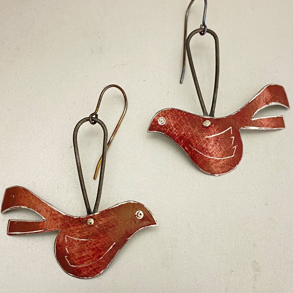 Little red bird earrings made from upcycled tin. 