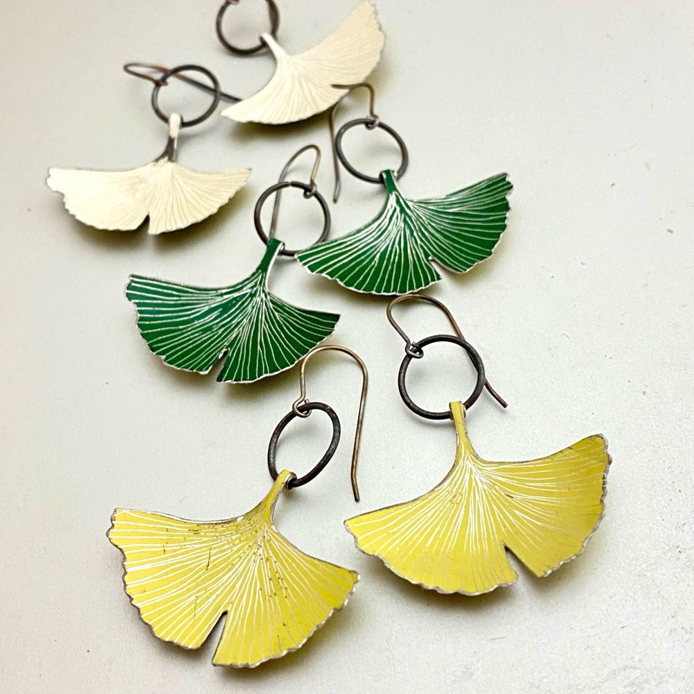 Ginkgo leaf earrings handmade from upcycled vintage tins. 