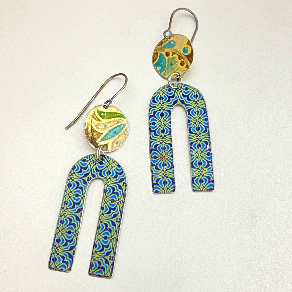 Upcycled tin earrings by Christine Terrell of adaptive reuse jewelry. 