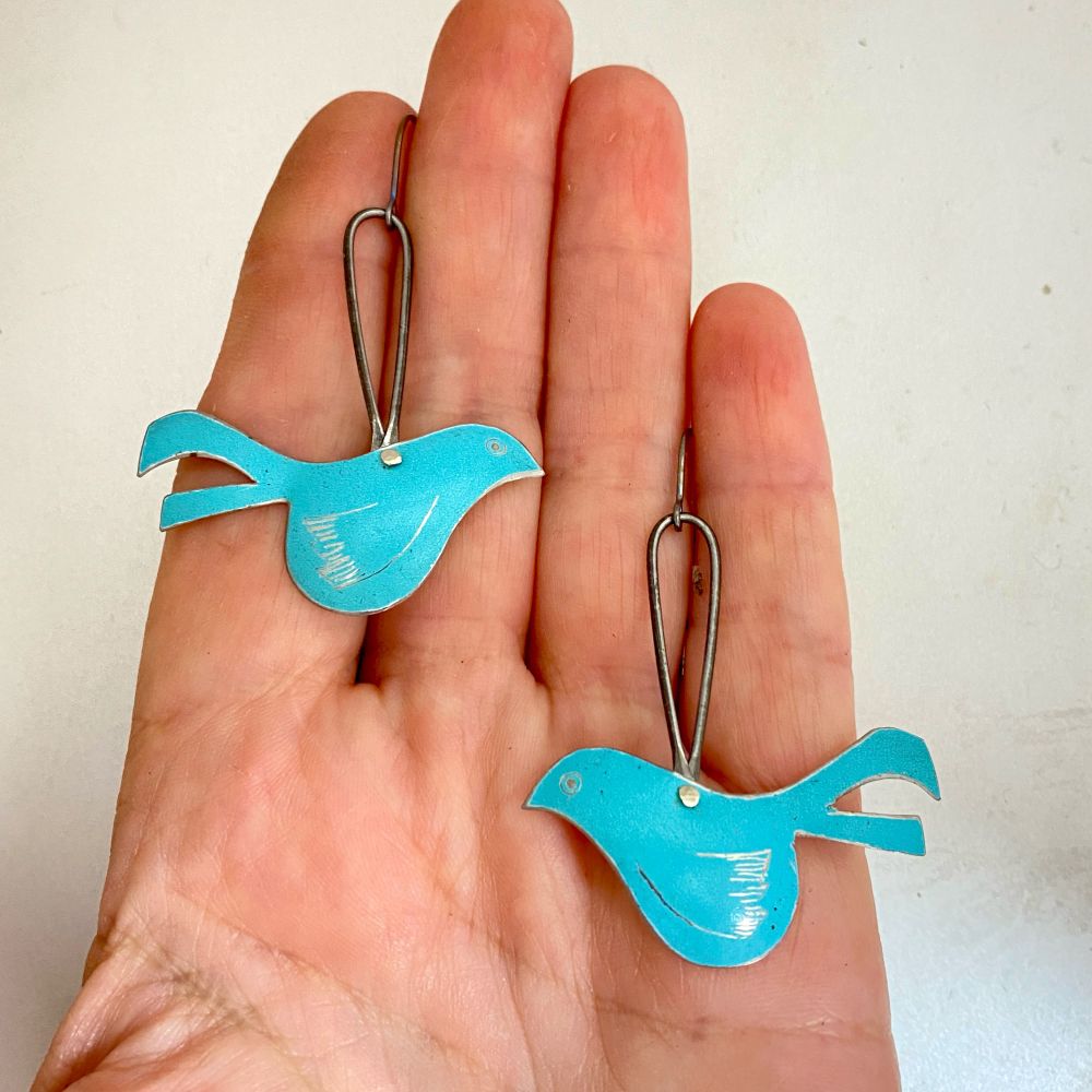 Little blue bird earrings made from upcycled tin. 