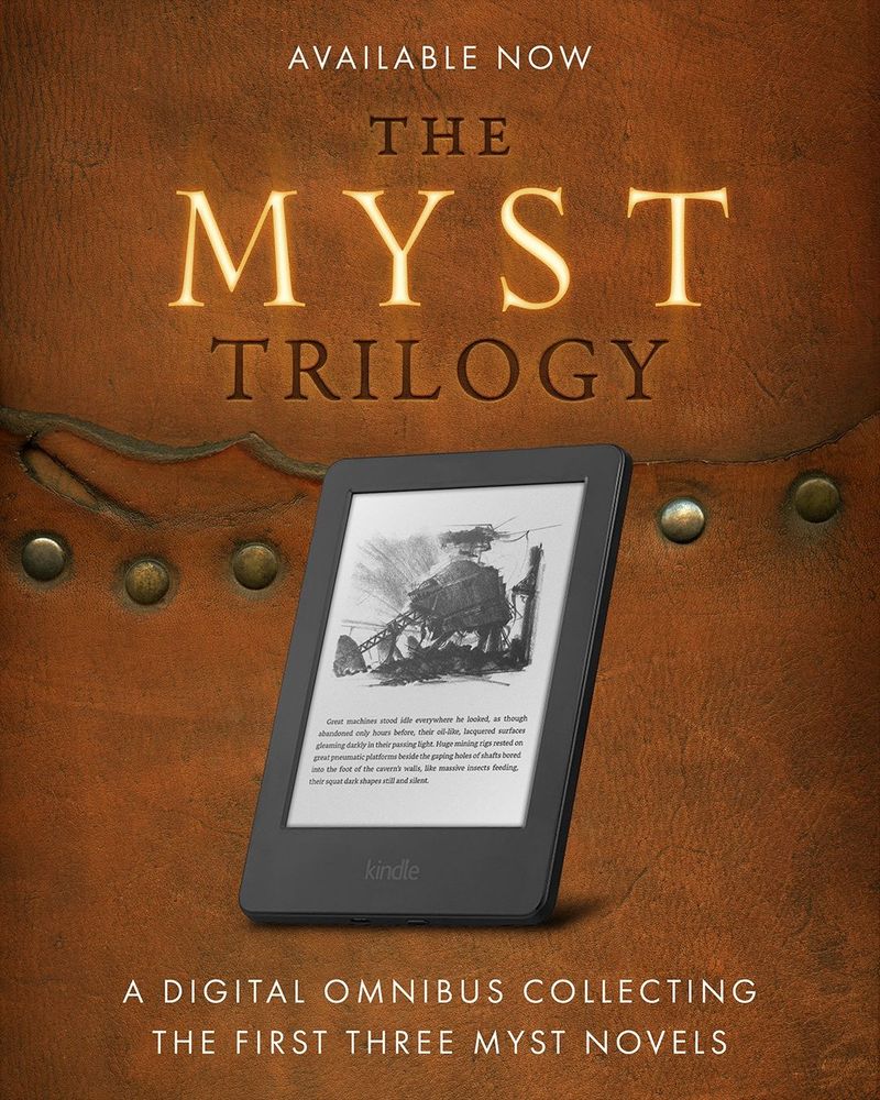 A promotional image for The Myst Trilogy eBook. The text reads “Available Now – The Myst Trilogy – A digital omnibus collecting the first three Myst novels.” The background is textured leather with metal rivets, reminiscent of an antique book cover. A Kindle e-reader displays a stylized sketch of a machine and a short passage of text beneath it.