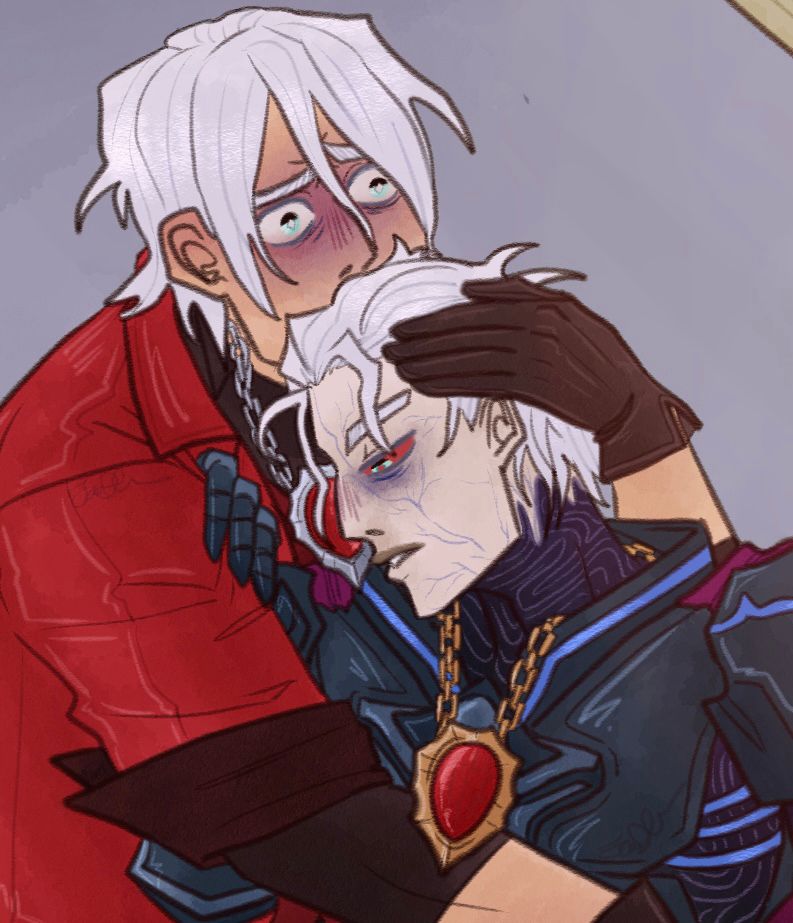 Close up of Dante and Vergil’s faces as Dante holds his twin gently