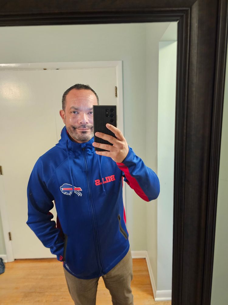 My husband wearing his new Bills hoodie. 