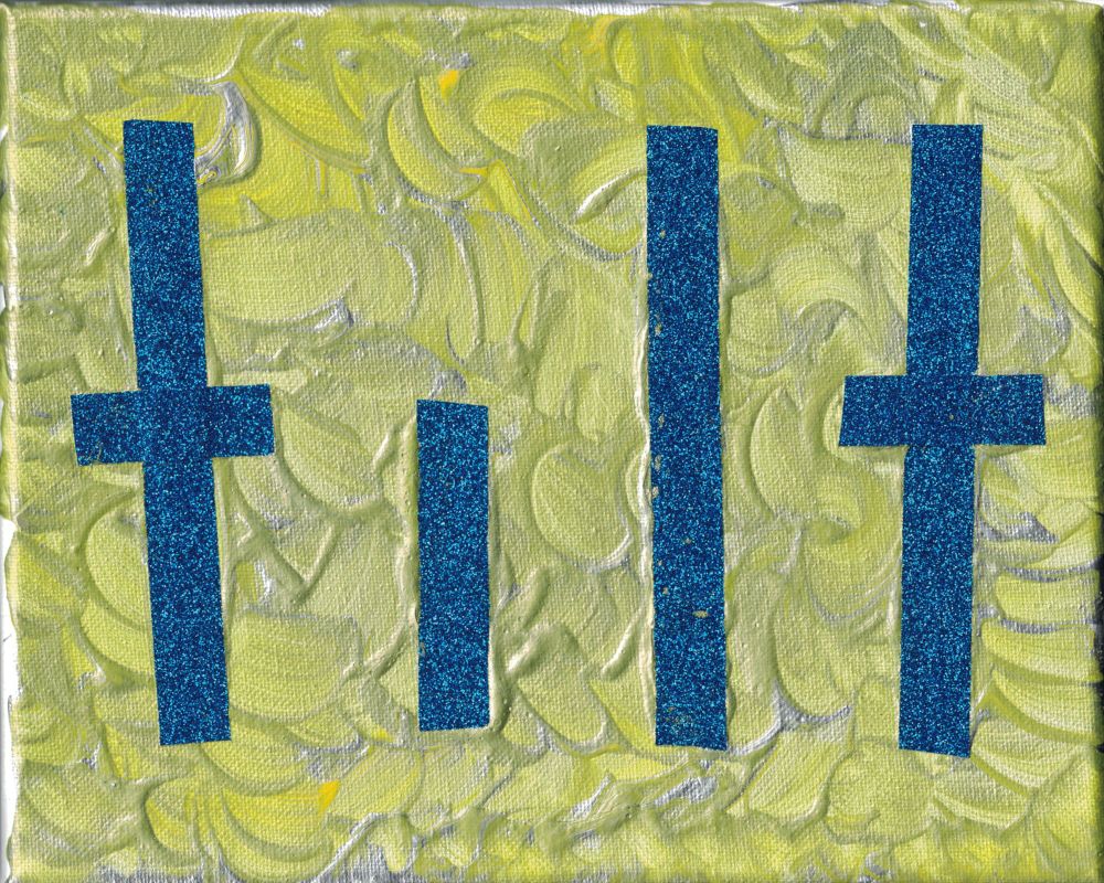 "tilt" (2023), swirled gold, yellow, and grayish patterned acrylic with sparkling blue ribbon arranged on top with lowercase "tilt". No dot over the "i".