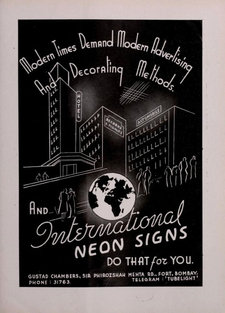 Advertisement from magazine FilmIndia that contains hand-drawn art deco style artwork of several tall buildings with neon signs as well as the company’s contact information.