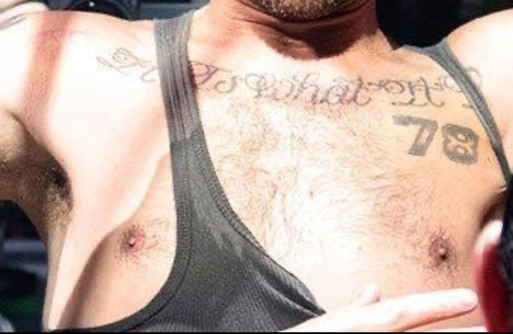 Close up of Louis Tomlinson lovely tiny nipples.