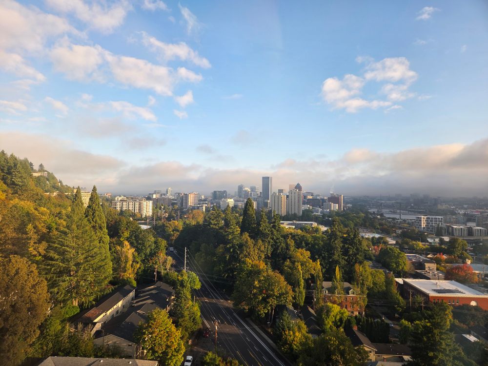 View of downtown Portland Oregon, from the aerial tram, with blue skies & a few clouds