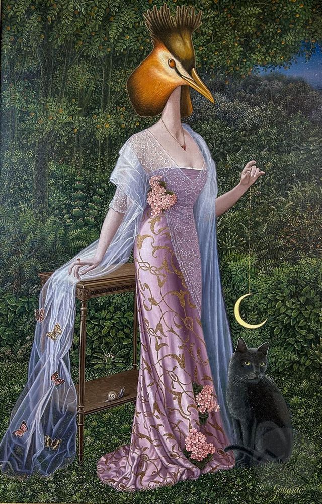 Painting of a woman wearing a long purple gown with a gauzy shawl, holding a crescent moon on a chain over a black cat's head. Her own head is a yellow bird with dark up-standing plumage. The background is a lush forest.