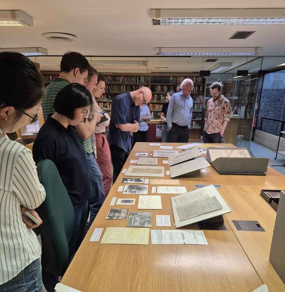 Researchers looking at display in the reading room