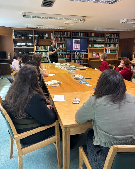 Induction day attendees listening to a talk on digital archives