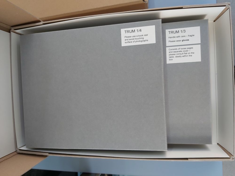 Jean Barker’s scrapbooks enclosed in a bespoke clamshell box made from archival box-board. Source: TRUM 1/3-4