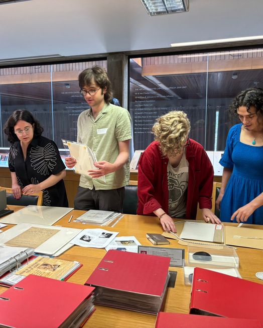 Induction day attendees preparing a display