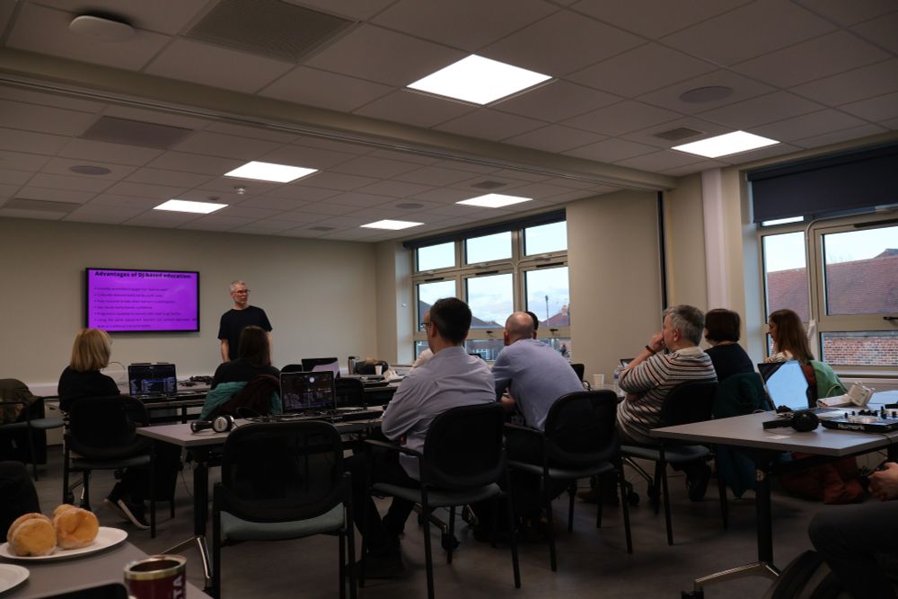 DJ school uk trains teachers to use DJ skills in their music lessons. Jim from DJ School UK takes it seriously and does not get distracted by free donuts.