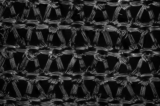 Nylon stockings under a microscope, 2021. Nylon, a polymer created in 1939, had widespread use, particularly and gradually replaced natural materials like silk, catgut, fur, and leather (Quye 2014: 214). Image: Source: https://commons.m.wikimedia.org/wiki/Template:Potd/2023-03-27_(pt) https://www.mpiwg-berlin.mpg.de/news/fabricated-natures-stories-bio-material-archive-deadline-july-15-2024