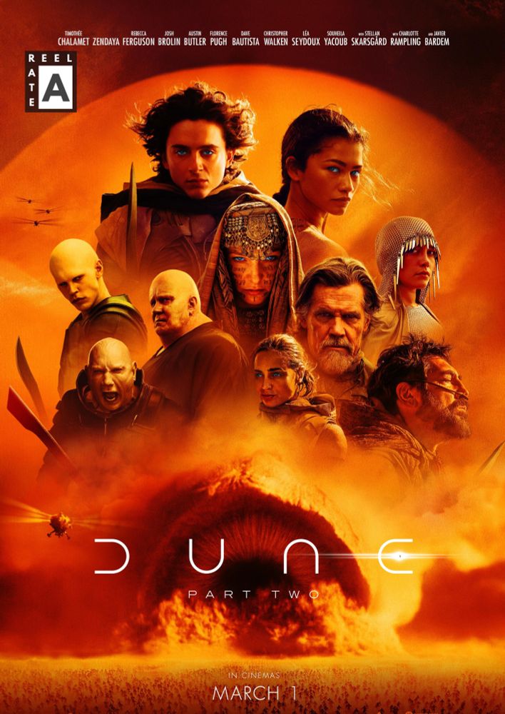 A dramatic, orange-hued movie poster for Dune: Part Two, featuring Timothée Chalamet as Paul Atreides at the center, surrounded by key characters including Zendaya’s Chani, Rebecca Ferguson’s Lady Jessica, and others. The background showcases a massive sandstorm with a colossal sandworm emerging from the dunes. The film’s title, ‘Dune: Part Two,’ is displayed in sleek, futuristic typography, with the release date ‘March 1’ noted below. The Reel Spill rating ‘A’ is visible in the top left corner.