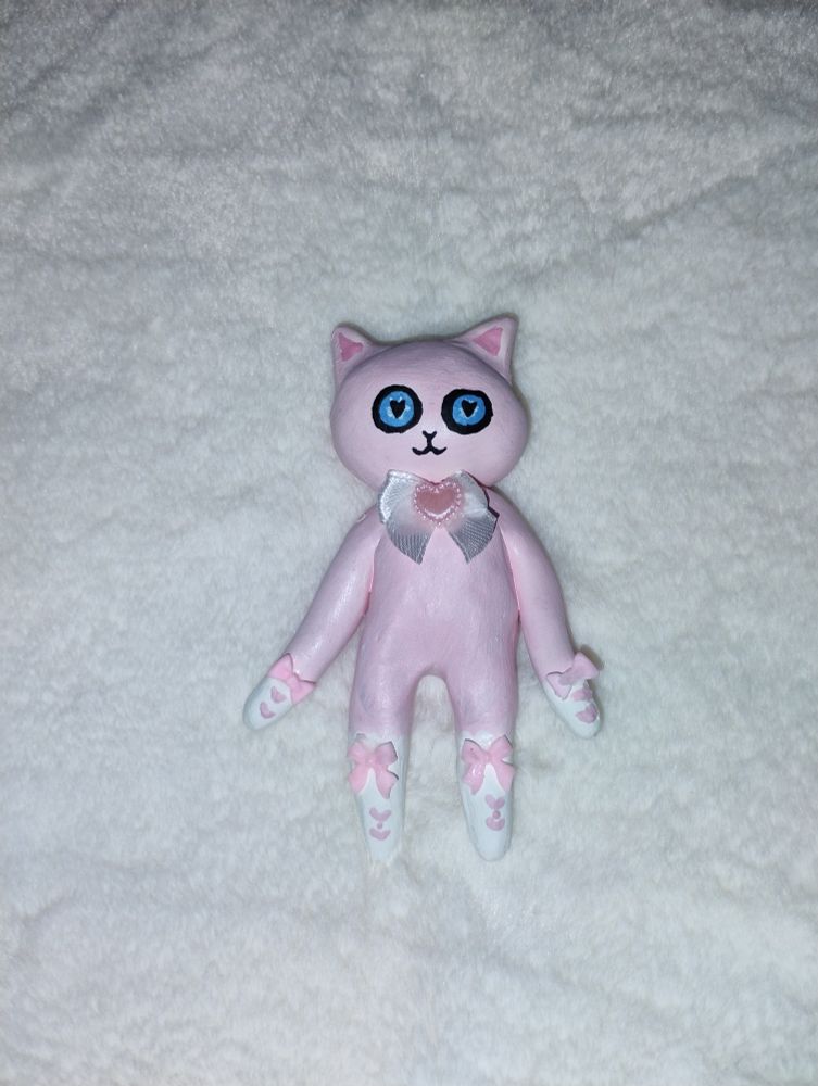 The same cat in different lighting.