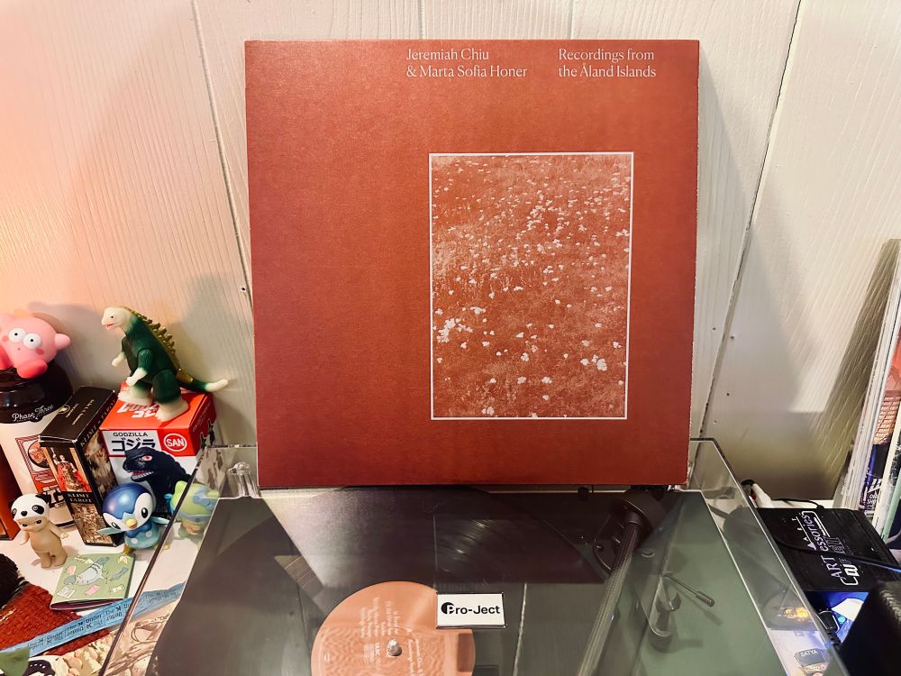 Recordings from the Åland Islands by by Jeremiah Chiu & Marta Sofia Honer vinyl cover on top of turntable 