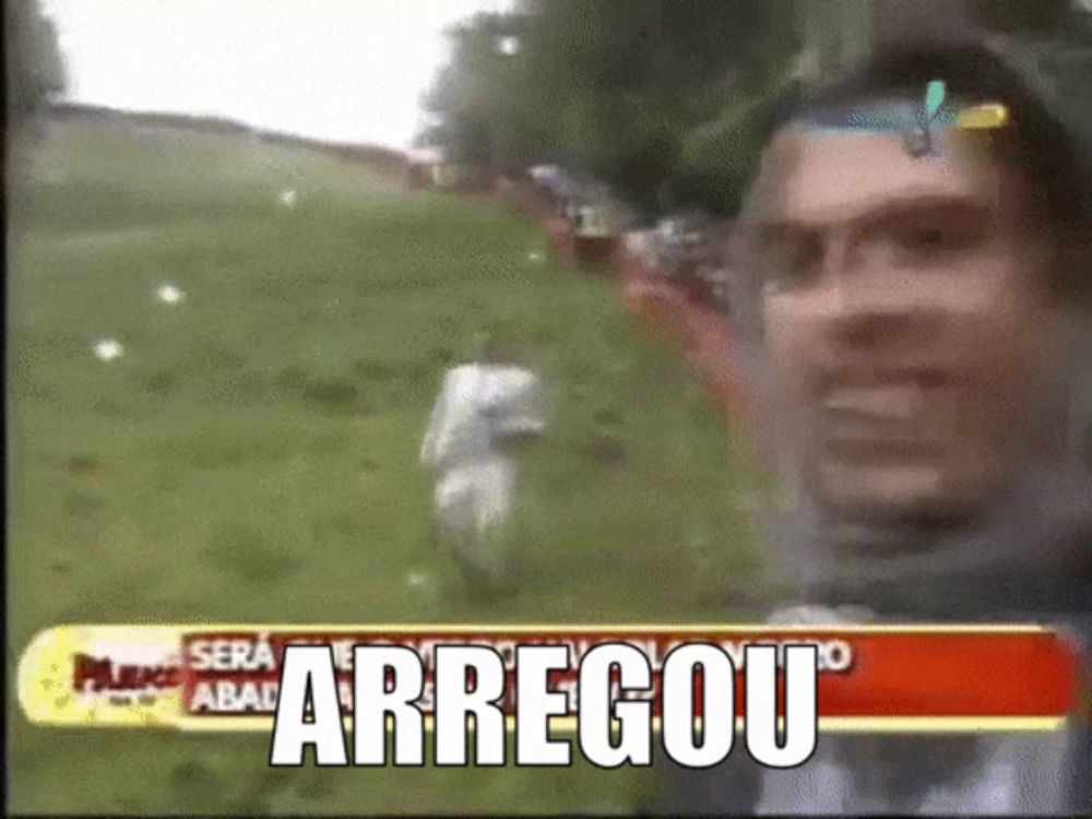 a man is standing in a field with the word arregou on the bottom