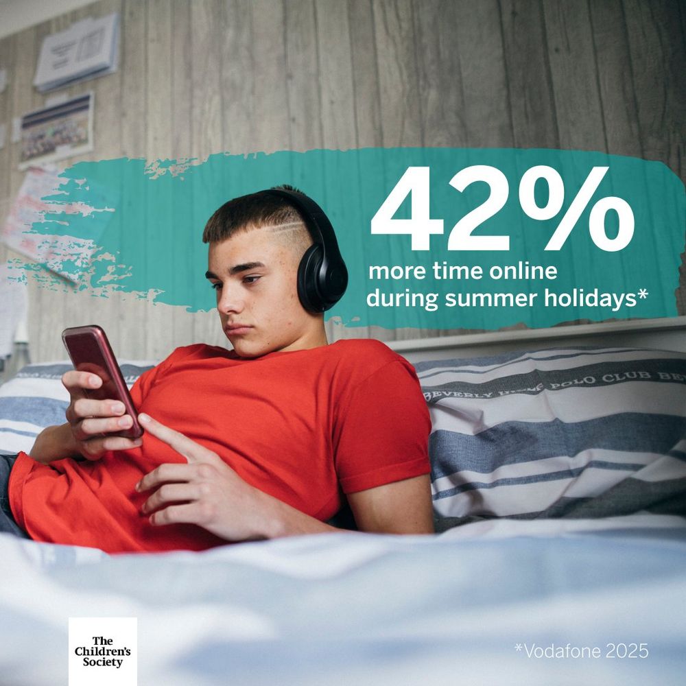 Teen wearing headphones and red shirt uses smartphone while lying on bed with striped bedding. Text: 42% more time online during summer holidays*. *Vodafone 2025.