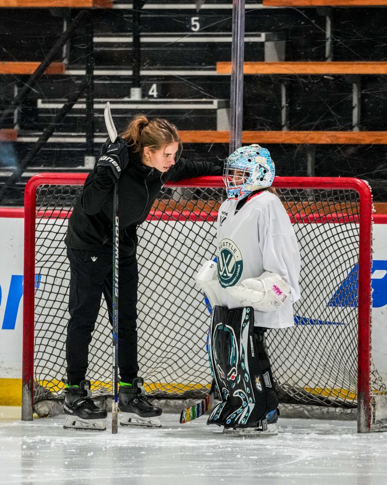 Hannah Murphy talks with fellow goalies at PWHL Seattle Summer Camp last month