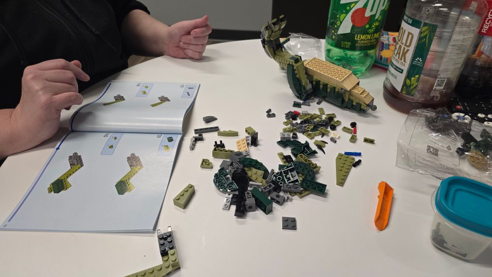 A pile of Lego pieces about to be assembled