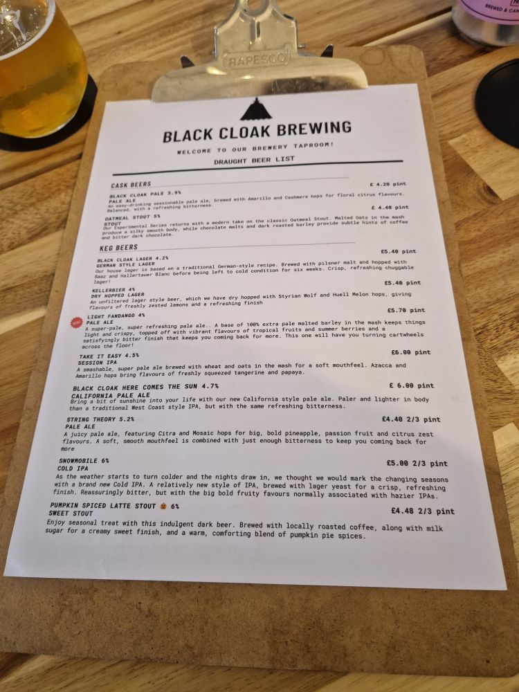 Black Cloak Brewing - Welcome to our brewery taproom. 

Cask Beers:
Black Cloak Pale 3.9%
Oatmeal Stout 5%

Keg Beers:
Black Cloak German Style Lager 4.2%
Kellerbier 4%
Light Fandango Pale Ale 4%
Take It Easy Session IPA 4.5%
Here Comes The Sun California Pale 4.7%
String Theory Pale 5.2%
Snowmobile Cold IPA 6%
Spiced Pumpkin Latte Stout 6%

