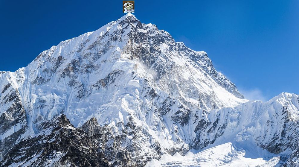 the peak of mount everest with azure's face slapped onto the tip of said mountain